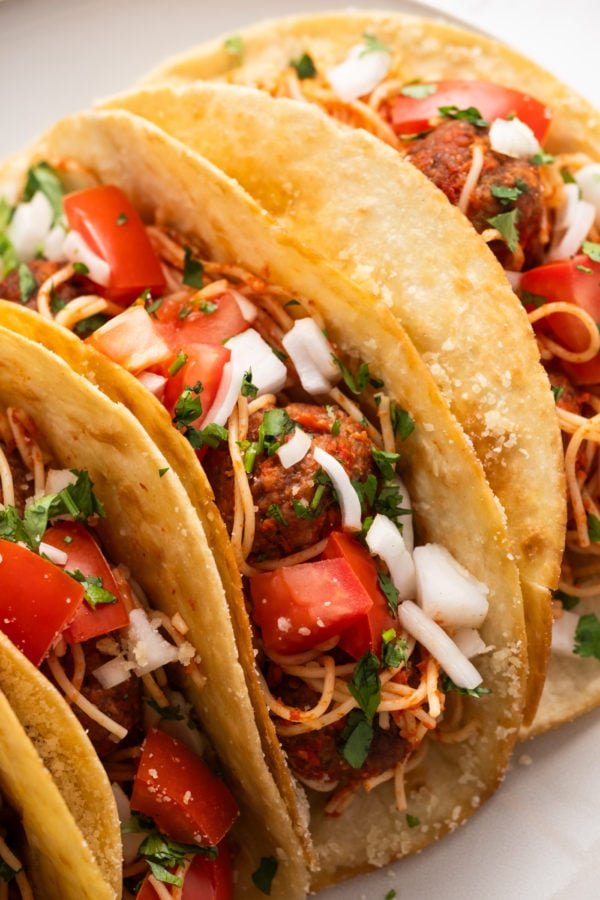 tacos filled with spaghetti pasta
