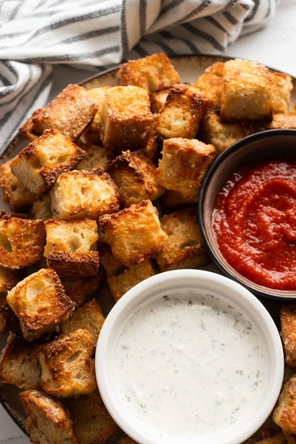 bread cubes dipped in Ranch dressing