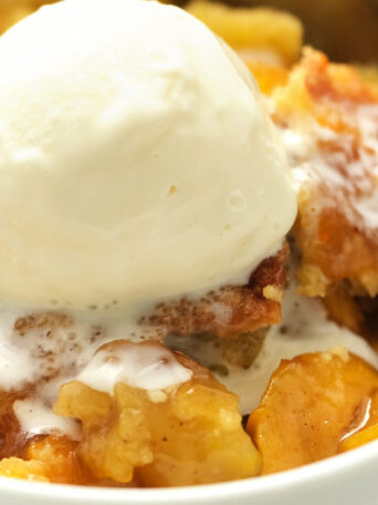 serving of peach cobbler with ice cream