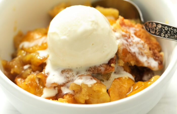 a serving of Peach Cobbler with Canned Peaches