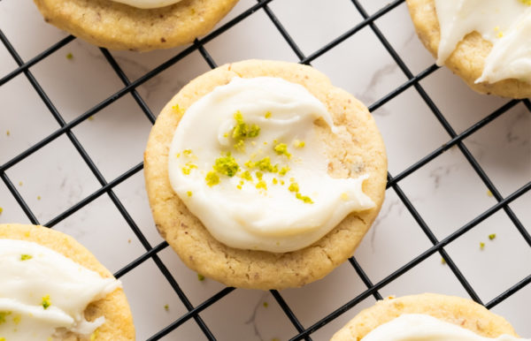 a frosted Key Lime Cookie with lime zest