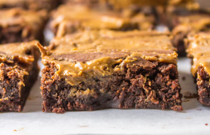 a brownie with swirled cookie butter on top
