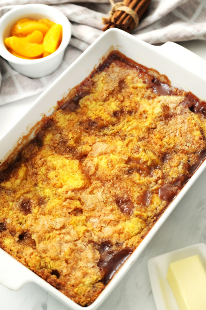 a hot Peach Cobbler with Cake Mix and Canned Peaches
