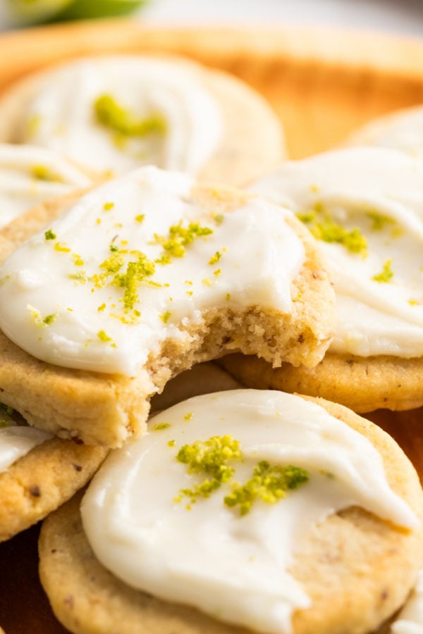 a bite of cookies with frosting