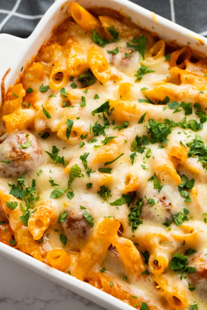 a cheesy pasta casserole with meatballs