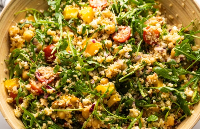 a Arugula Salad with quinoa