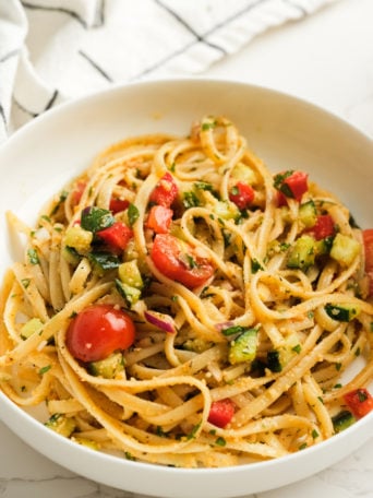 bowl of salad with spaghetti pasta