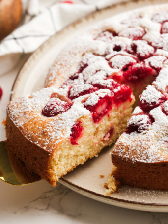 serving a piece of Summer Raspberry Cake