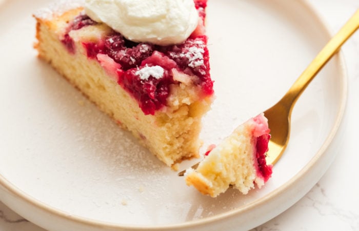 taking a bite of Raspberry Cake