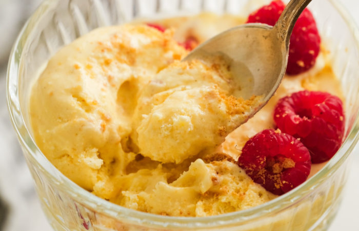 taking a spoonful bite of lemon curd ice cream
