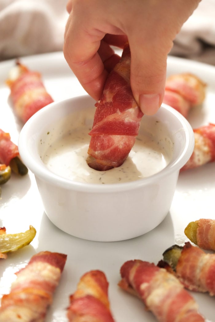 dipping a Bacon Ranch Pickle Popper