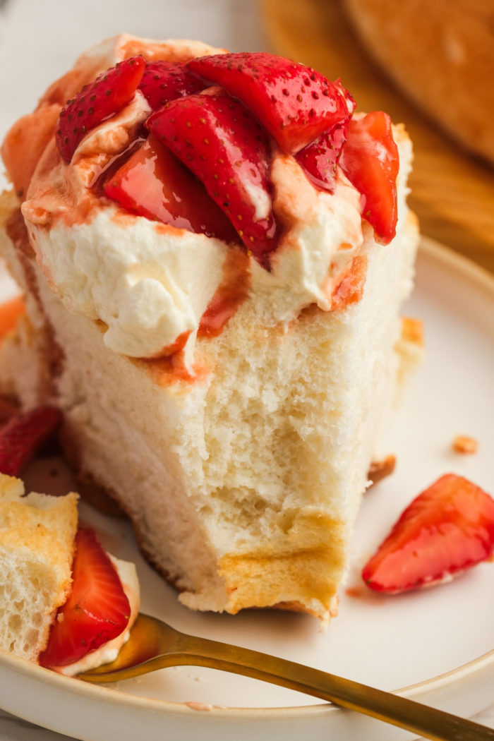 a bite of Angel Shortcake with strawberries