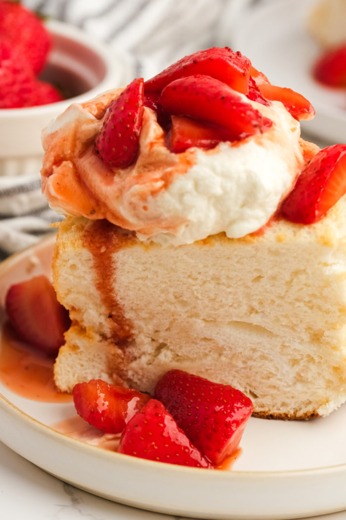 slice of homemade angel cake with strawberries