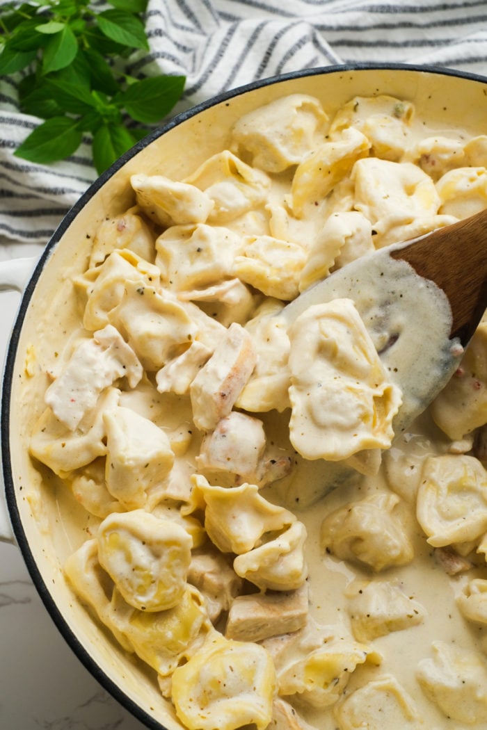 makinging chicken and tortellini dish