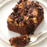 taking a bite of chocolate zucchini cake