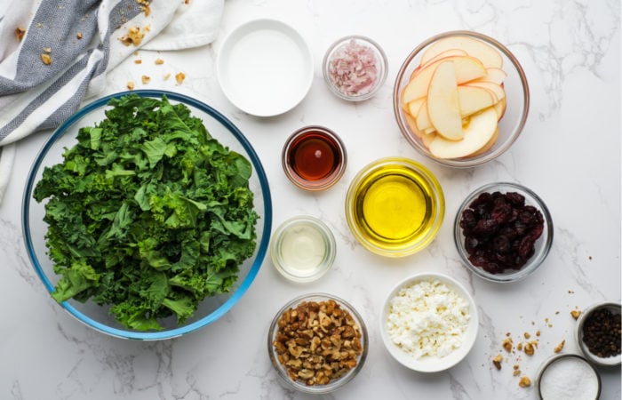 ingredients to make a Kale Salad with Apples and walnuts