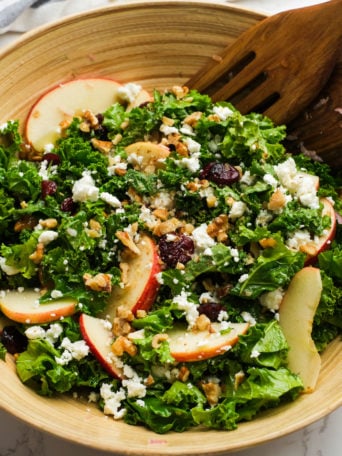 a Thanksgiving Kale Salad with Apples and walnuts (dried cherries and feta cheese)