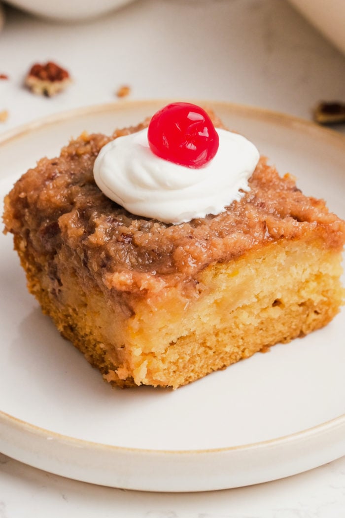 old fashioned cocktail cake with cream and a cherry