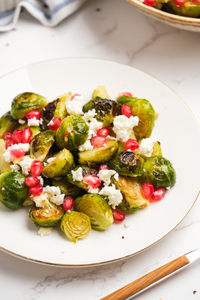 a serving of Honey Brussels Sprouts with cheese