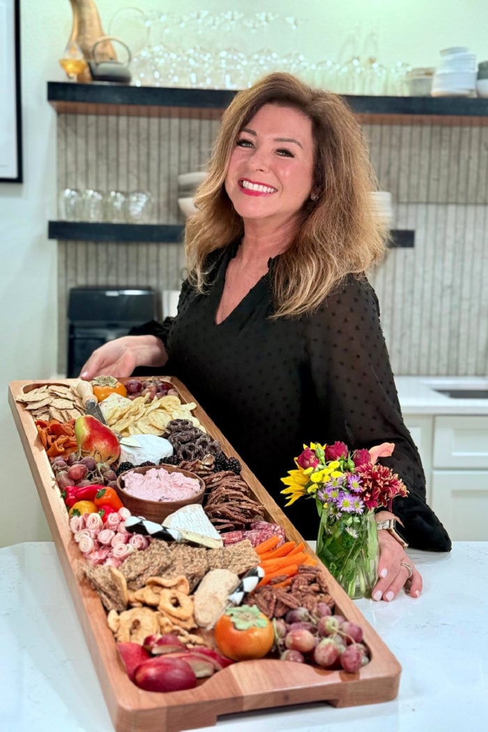 holding a large platter