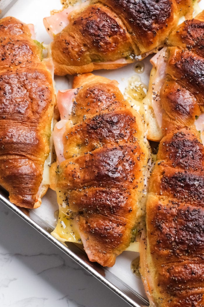 a baked ham and cheese croissant