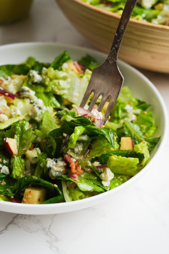 fork bite of Apple Blue Cheese Salad