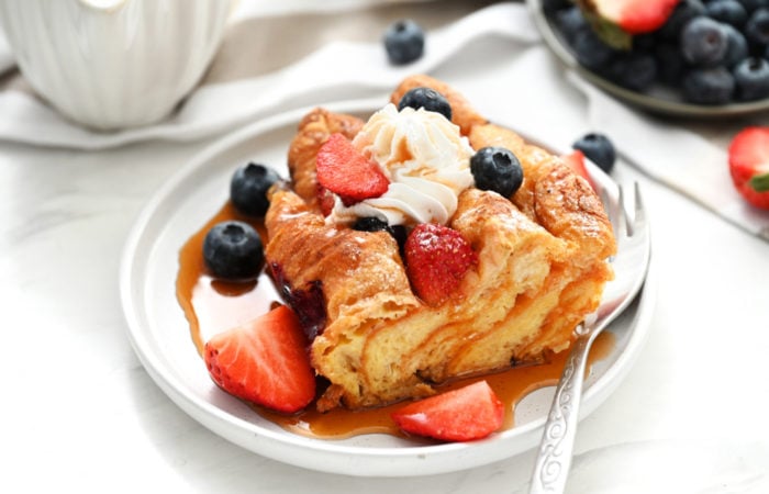 serving of French Toast Croissant Casserole with syrup