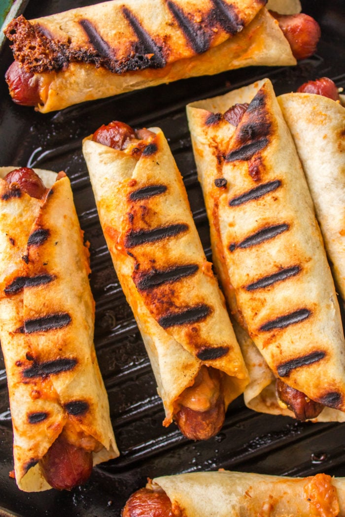 making wrapped hot dogs with tortillas