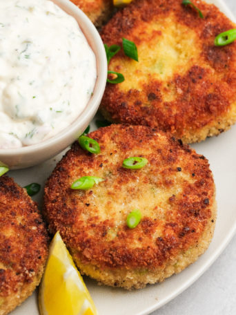 bowl of dipping Sauce for Fish Cakes on plate