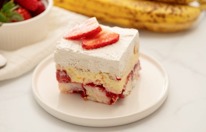 a serving of Strawberry Banana Pudding Cake