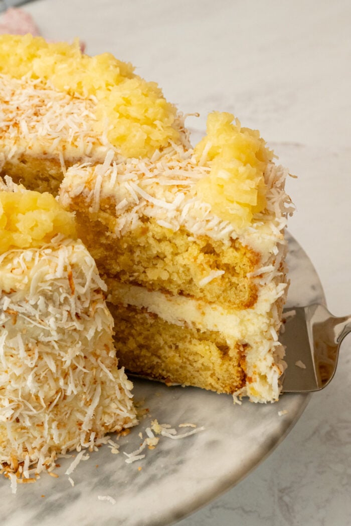 Serving a slice of pineapple cake