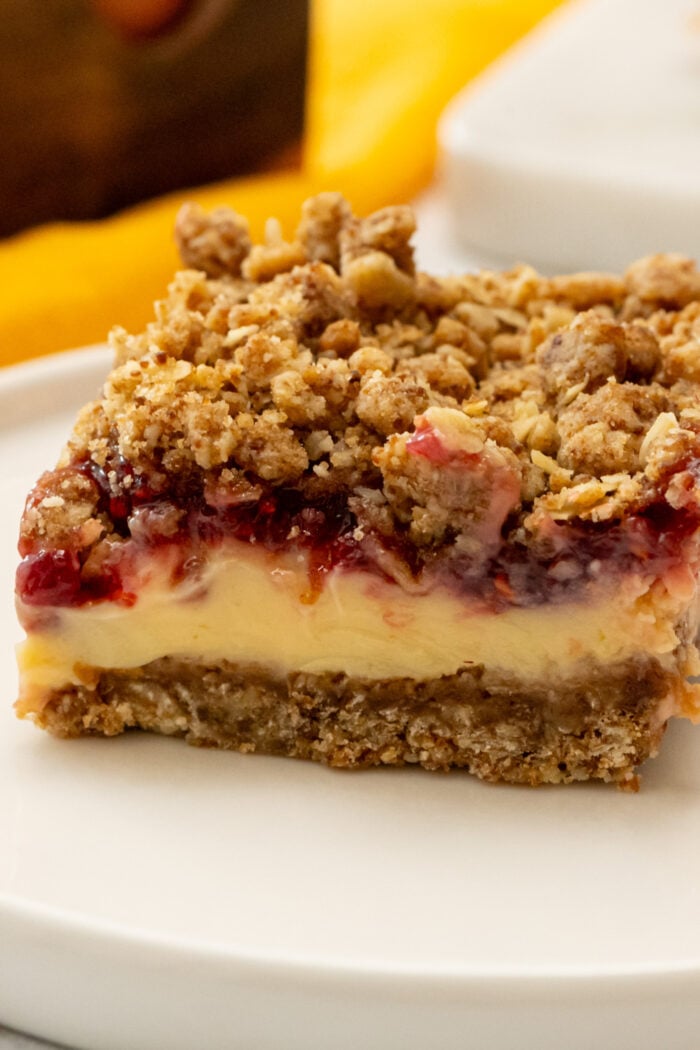 a serving of Lemon Raspberry Bar with a crumble