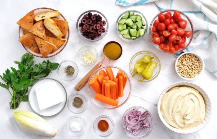 ingredients to make a loaded hummus plate