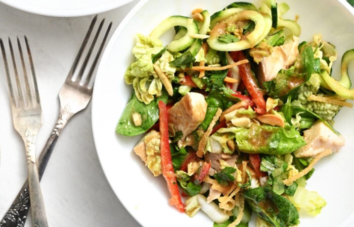 serving of chicken salad with greens