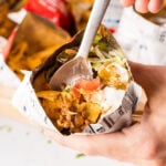 a fork bite of a taco salad in a bag