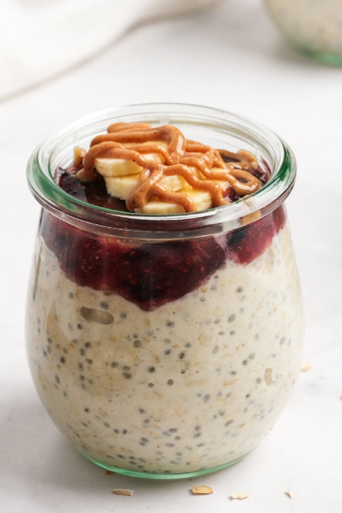 Berry Cheesecake Overnight Oat breakfast with bananas