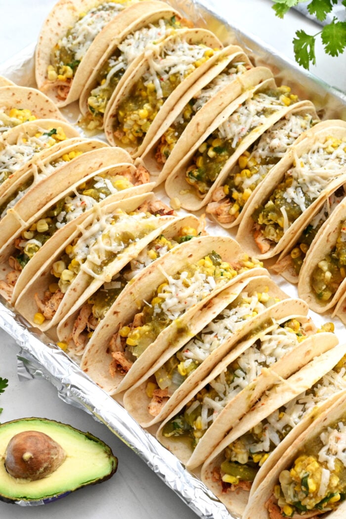 a sheet pan full of stuffed chicken tacos