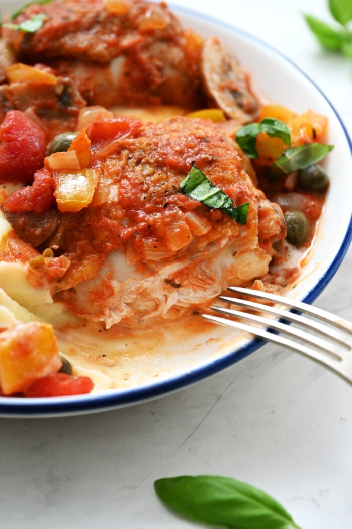 a bite of Dutch Oven Chicken Cacciatore