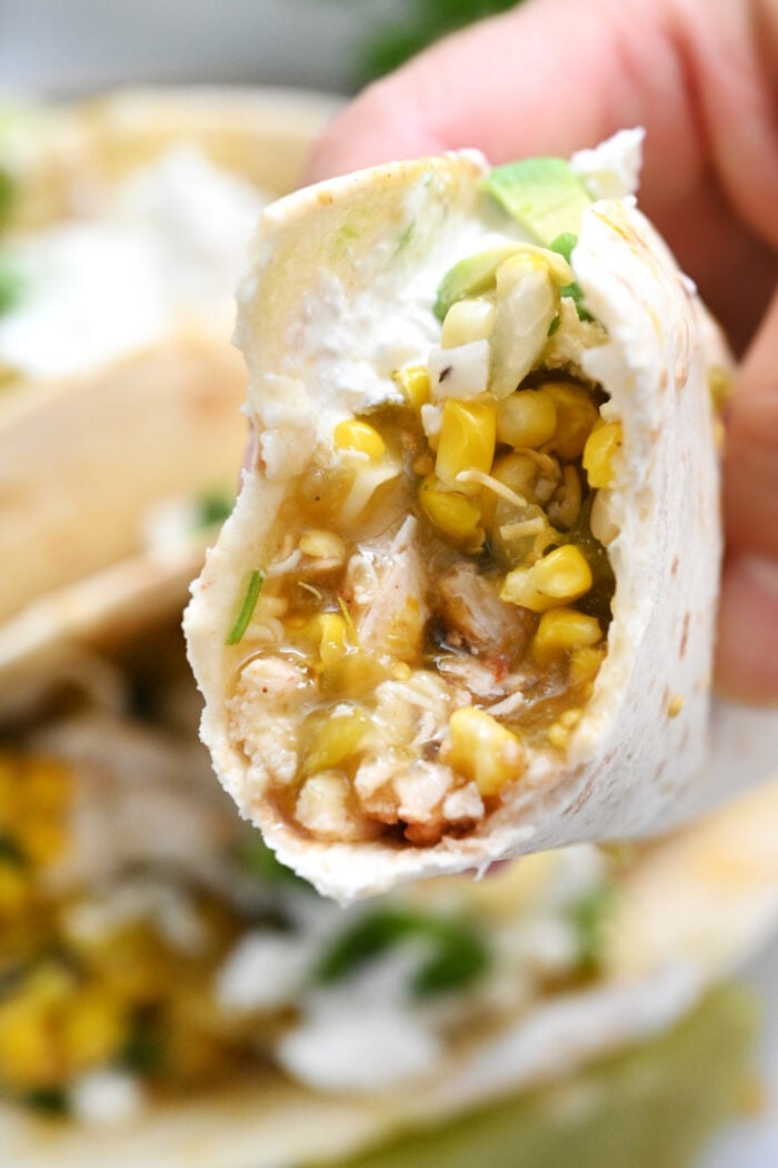 a bite of Sheet Pan Chicken Taco