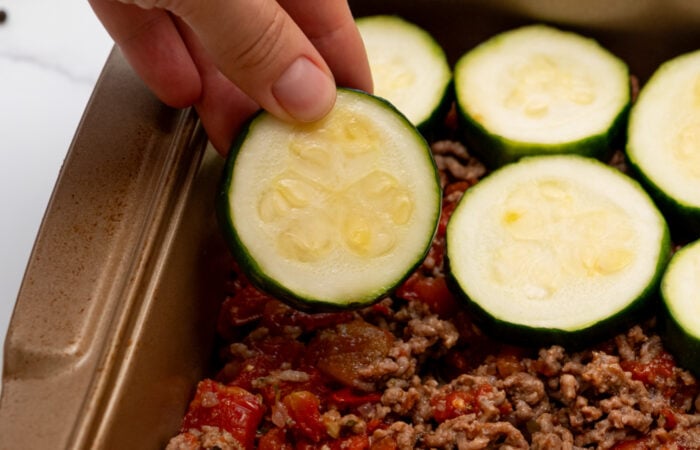 assembling zucchini bake