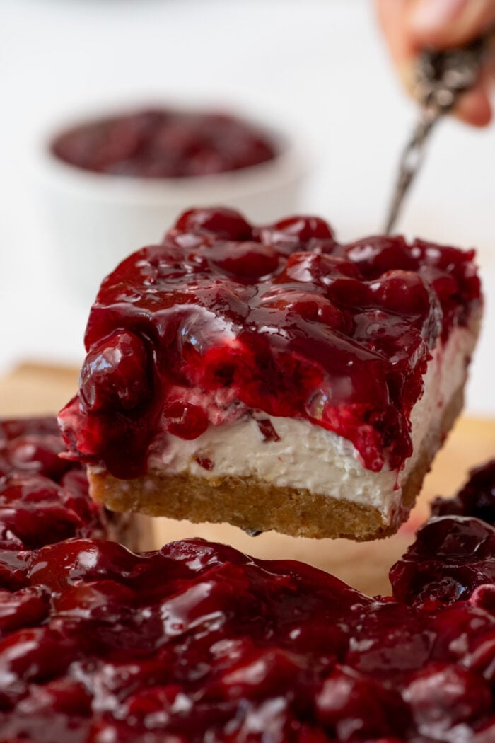 serving cheesecake with cherries