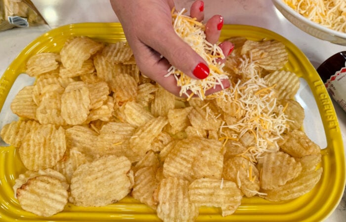 adding cheese on Ruffle potato chips
