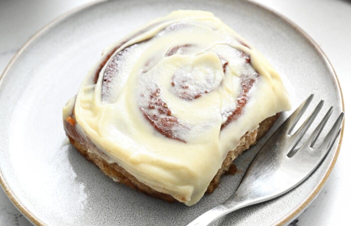 a cinnamon roll on a plate