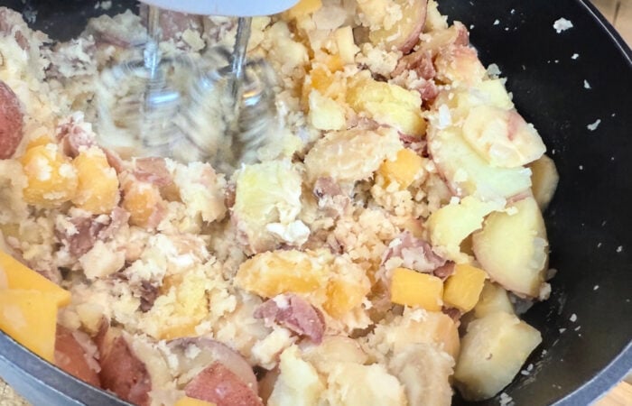 mixing potatoes, rutabaga and parsnips