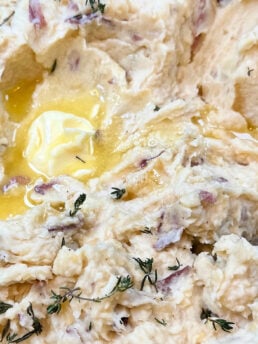 melted butter on potatoes