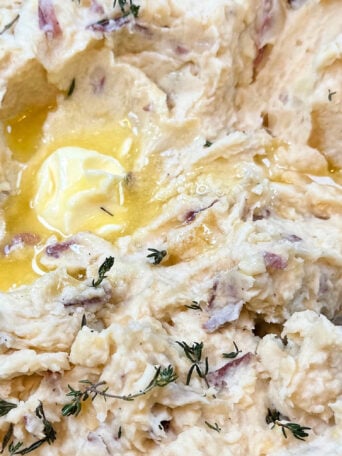 melted butter on potatoes