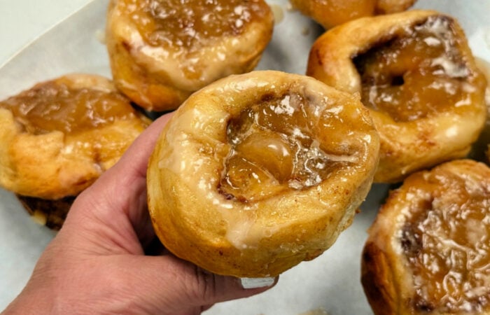 a hot gooey cinnamon roll with apple