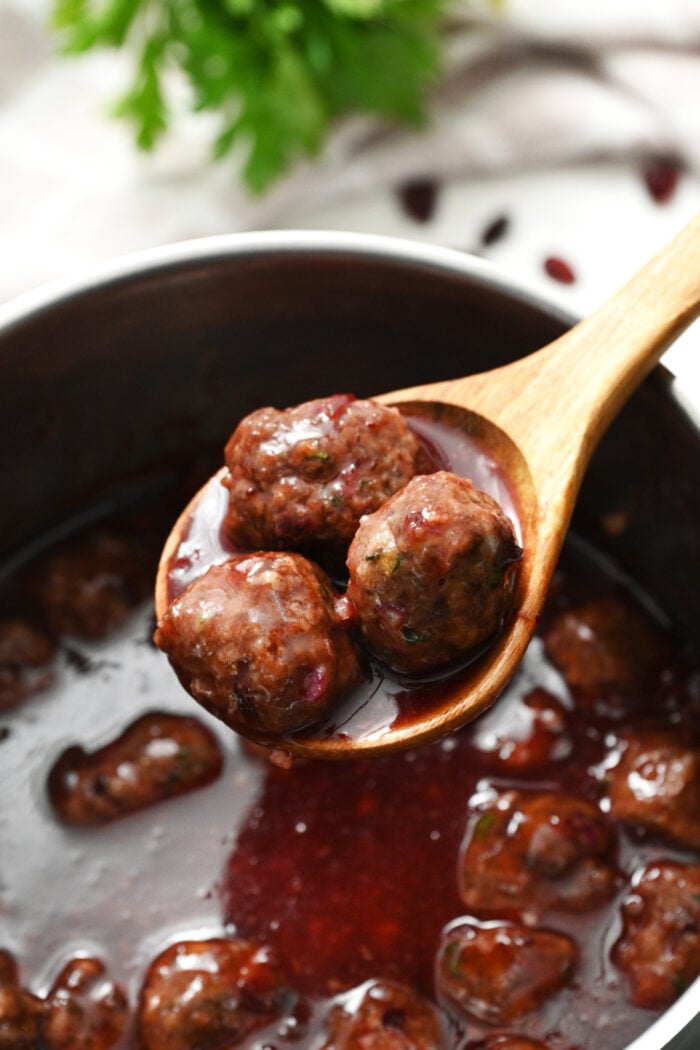 serving saucy meatballs