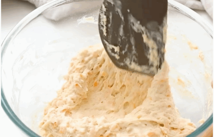 mixing biscuit batter