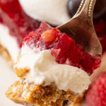 layers of cranberry salad with pretzel crust